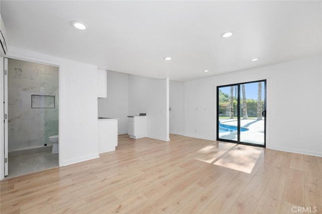 unfurnished room featuring light hardwood / wood-style flooring