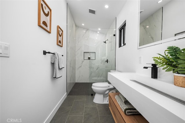 bathroom with a marble finish shower, toilet, baseboards, visible vents, and recessed lighting