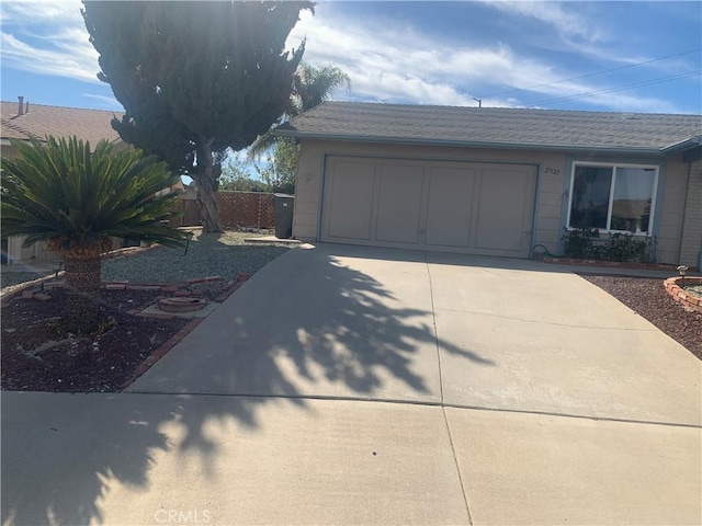 exterior space with a garage