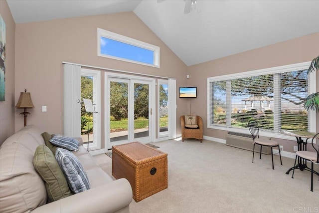 interior space featuring ceiling fan and lofted ceiling