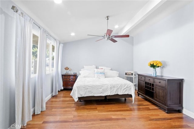 bedroom featuring baseboards, lofted ceiling, ceiling fan, light wood-type flooring, and recessed lighting