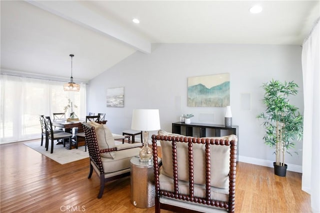 sitting room with vaulted ceiling with beams, baseboards, wood finished floors, and recessed lighting