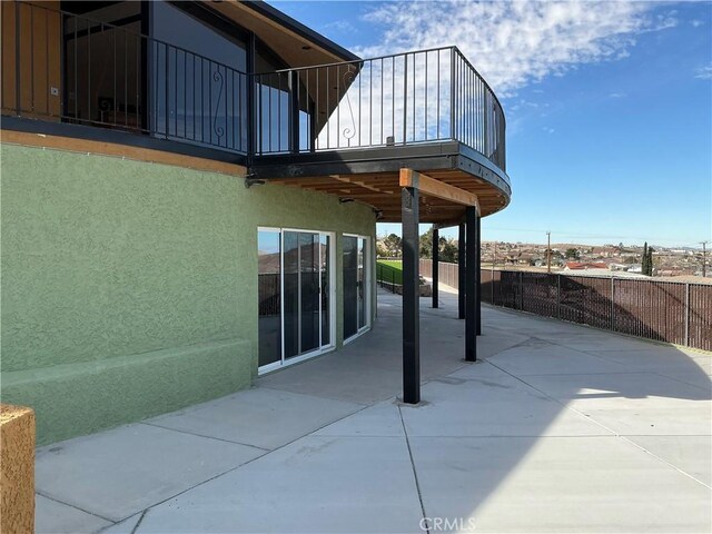 10 Hilltop, Barstow, CA 92311 - view of patio / terrace featuring a balcony and fence