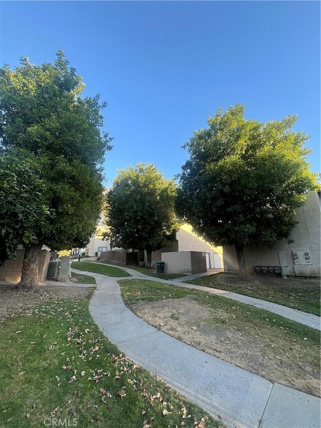 view of community featuring a yard