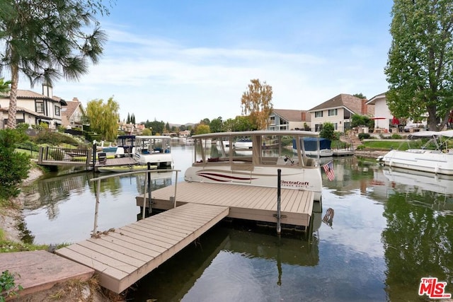 view of dock with a water view