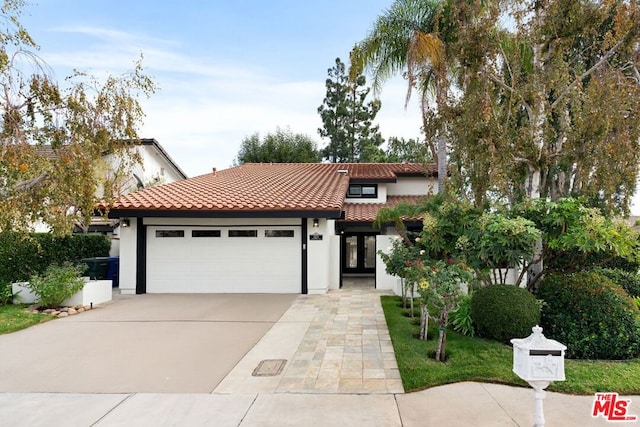 view of front of property featuring a garage