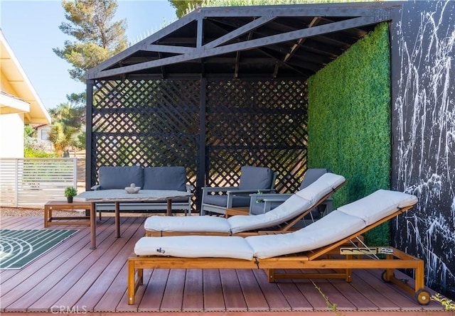 wooden deck with an outdoor hangout area