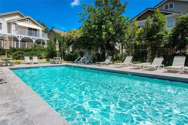 view of swimming pool featuring a patio