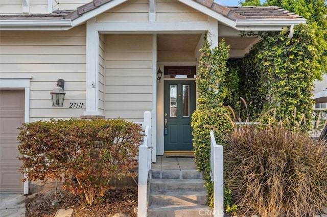 property entrance featuring a garage