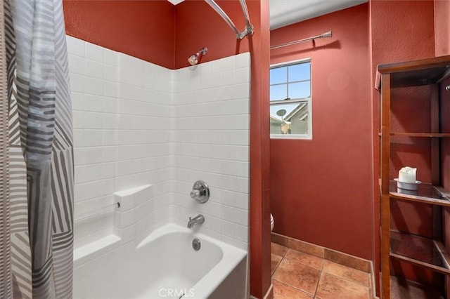 bathroom with tile patterned flooring and shower / tub combo with curtain