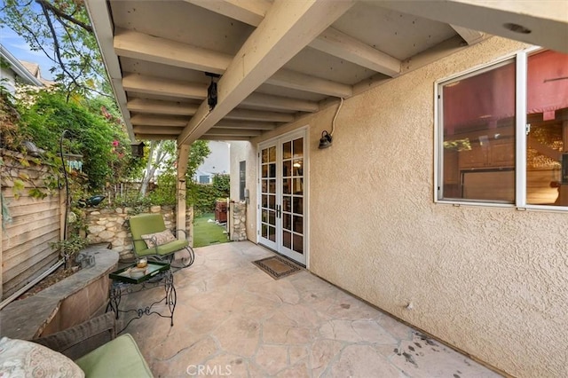 view of patio featuring french doors