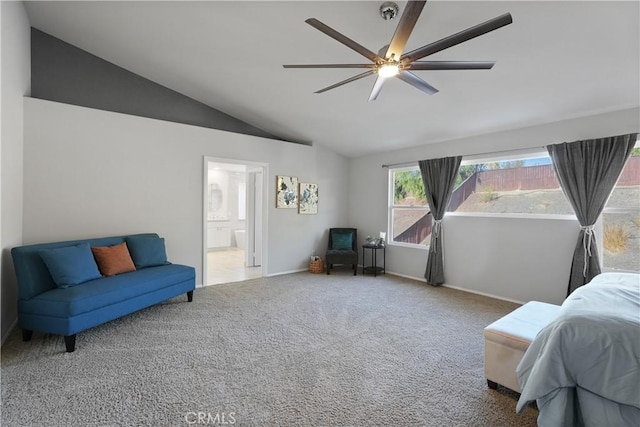 carpeted living room with ceiling fan and vaulted ceiling