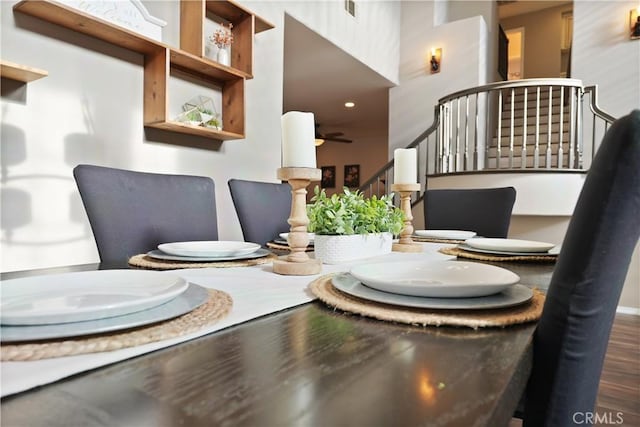 dining area with dark wood-type flooring