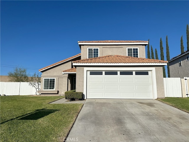 view of front of house featuring a front yard and a garage