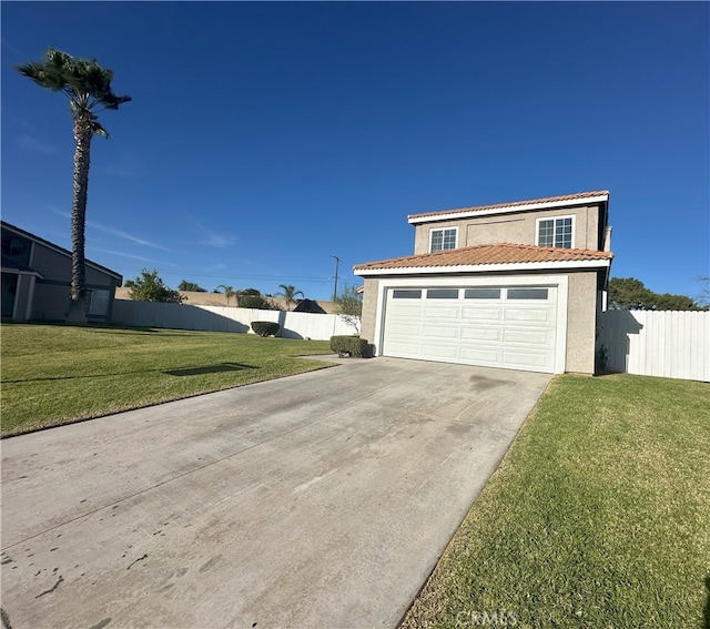 garage with a lawn