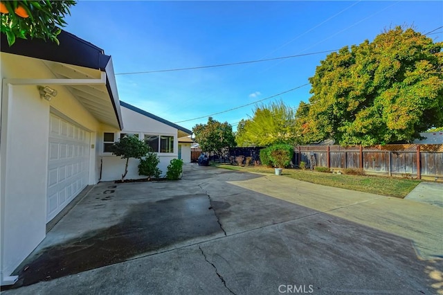 view of patio / terrace with a garage