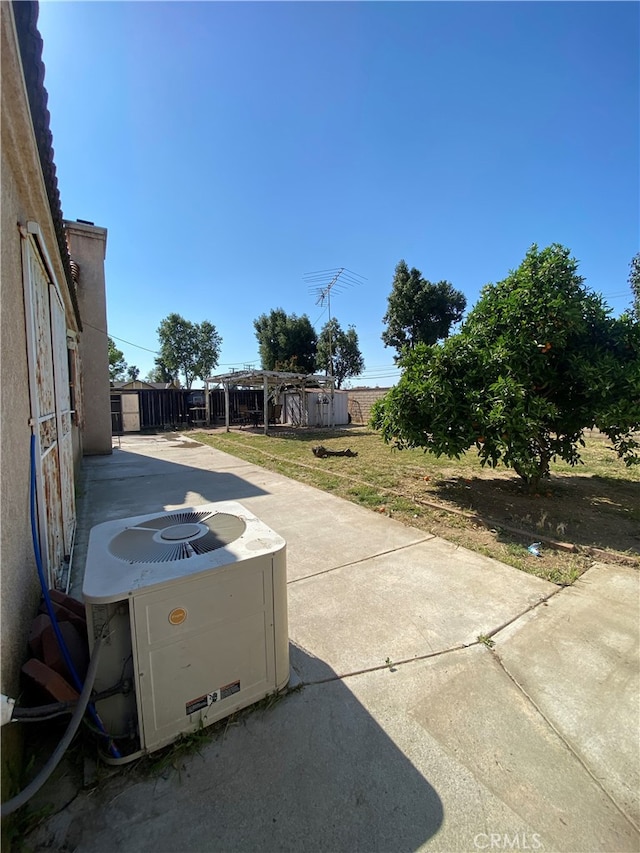 view of patio with central air condition unit