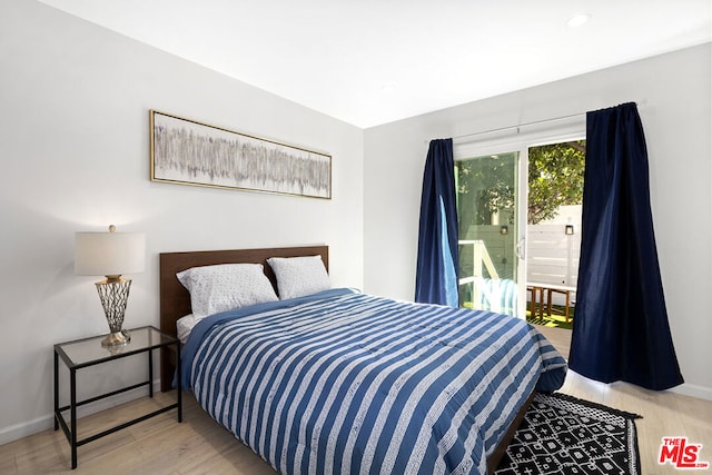 bedroom featuring light wood-type flooring