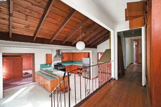 kitchen featuring appliances with stainless steel finishes, dark hardwood / wood-style flooring, wall chimney exhaust hood, wood ceiling, and lofted ceiling with beams