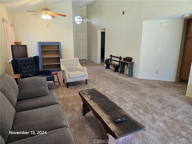 living room featuring ceiling fan, light carpet, and high vaulted ceiling