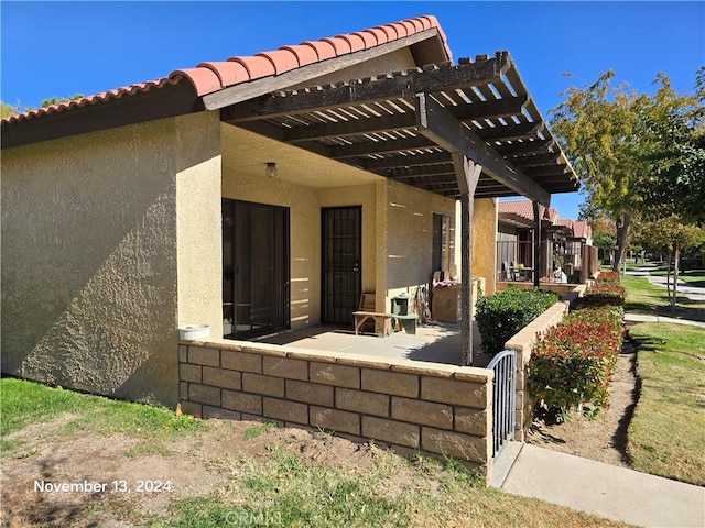 view of patio / terrace featuring a pergola