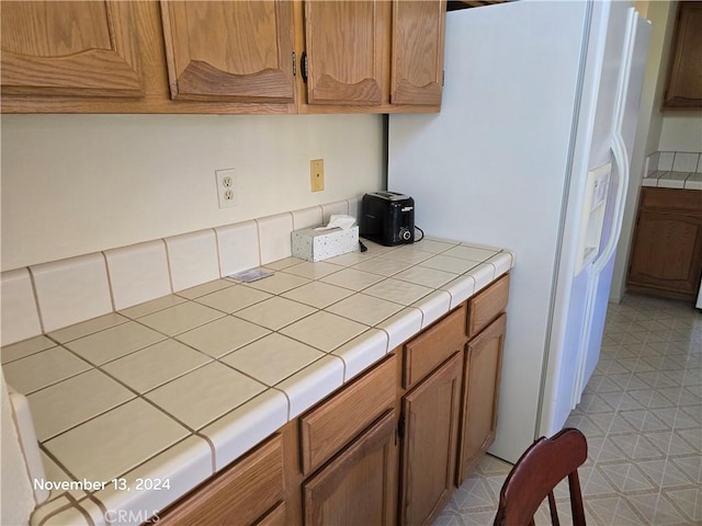 kitchen featuring tile counters