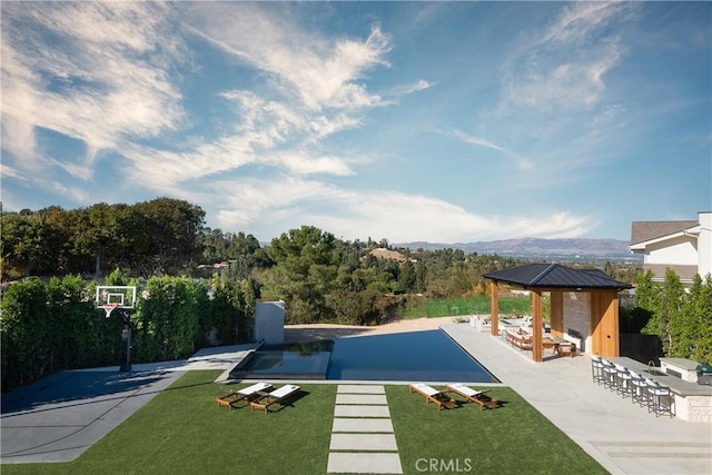 view of pool featuring a gazebo, a yard, and a patio area