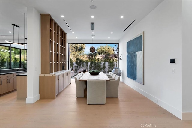 dining room featuring light wood-type flooring