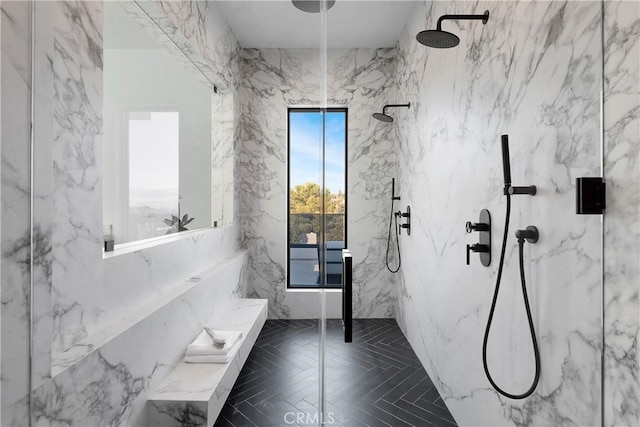 bathroom with tiled shower and parquet floors