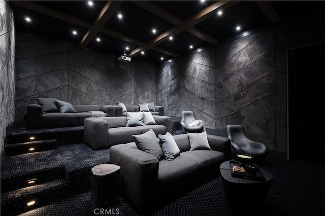 carpeted cinema with beamed ceiling, a high ceiling, and coffered ceiling