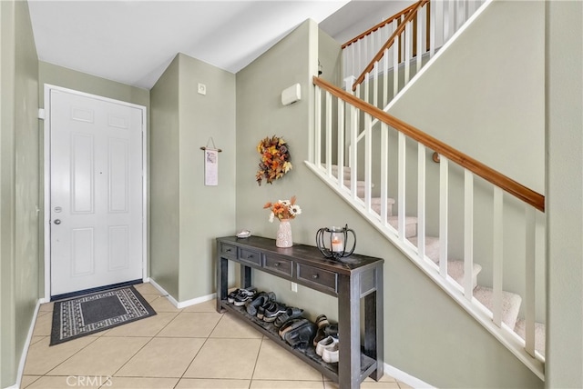 foyer with light tile patterned floors