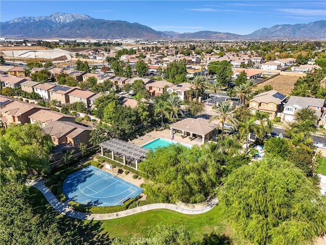 birds eye view of property featuring a mountain view