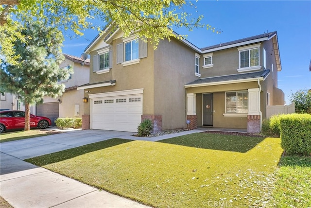 view of front of property featuring a garage and a front yard