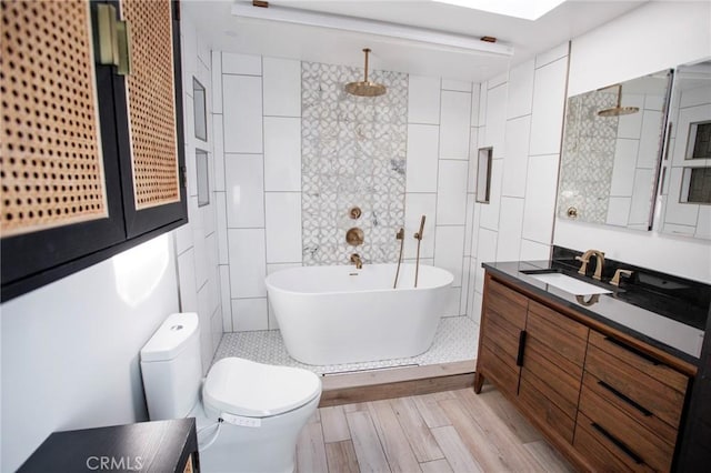 full bathroom featuring vanity, plus walk in shower, toilet, tile walls, and wood-type flooring