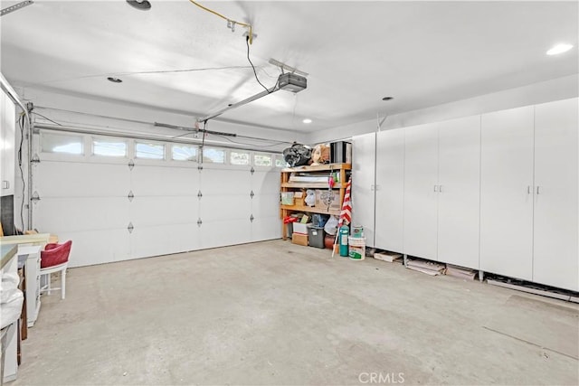 garage featuring a garage door opener