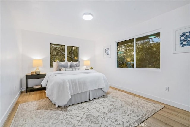 bedroom featuring hardwood / wood-style flooring