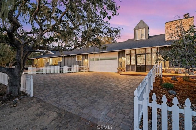 view of front of house with a garage