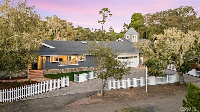 view of front of home featuring a garage