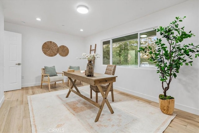 home office with light wood-type flooring