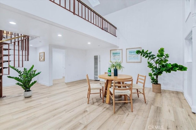 dining area with light wood-type flooring