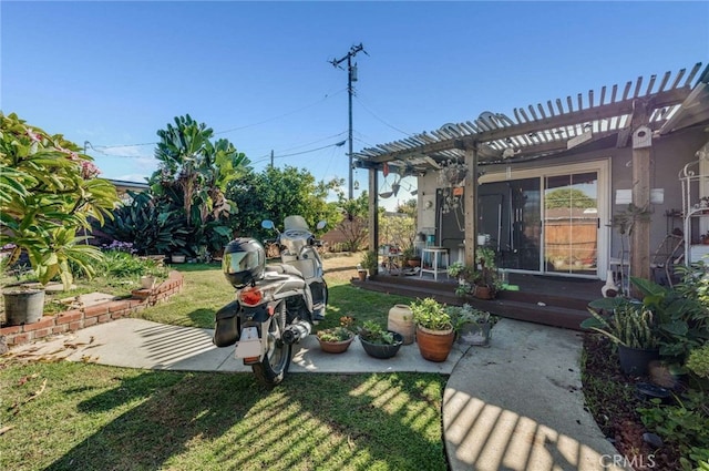 view of yard with a patio area and a pergola