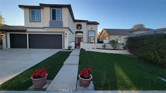 front facade with a front lawn and a garage