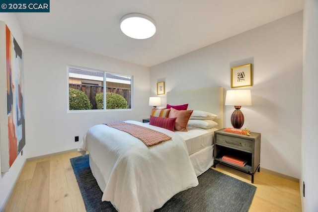 bedroom featuring light hardwood / wood-style flooring