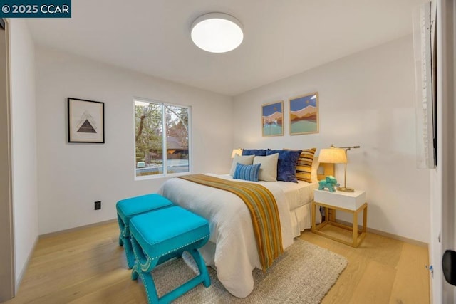 bedroom featuring light wood-type flooring