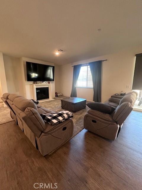 living room with hardwood / wood-style flooring