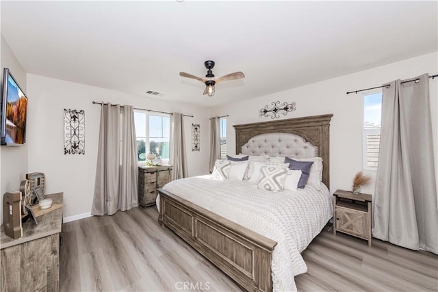 bedroom featuring ceiling fan and light wood-type flooring