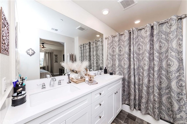 bathroom with vanity and ceiling fan