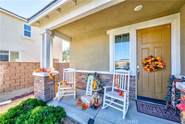 property entrance with a porch