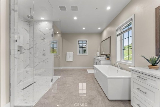 bathroom with separate shower and tub and vanity