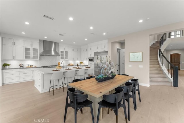 dining room with light hardwood / wood-style flooring